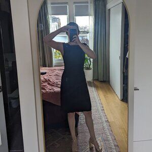 Well-tailored black work dress